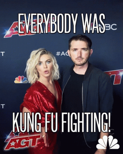 Man And Woman On Red Carpet Saying Kung Fu Fighting GIF