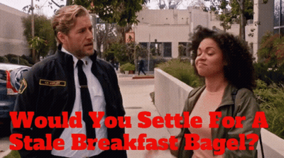 Man And Woman On Sidewalk Would You Settle For A Stale Breakfast Bagel GIF