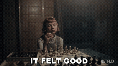 Man And Woman Playing Chess GIF