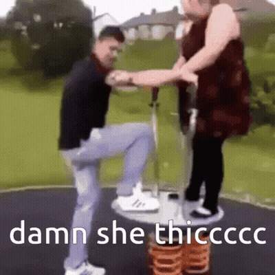 Man And Woman Playing On Playground With Damn She Thicccc GIF