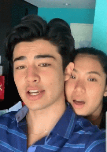 Man And Woman Posing GIF