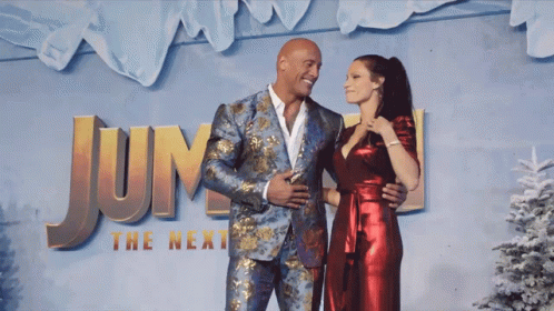 Man And Woman Posing In Front Of Jump Sign GIF