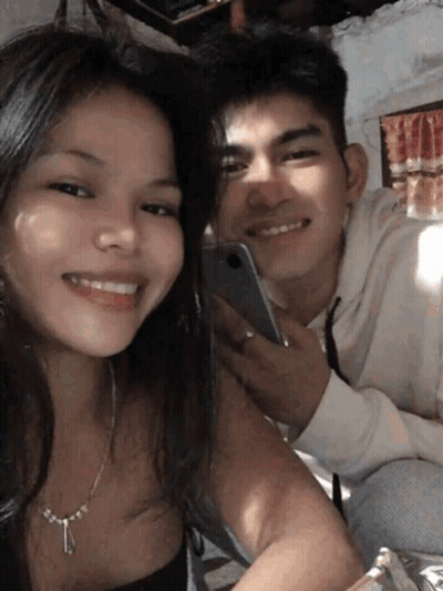 Man And Woman Posing Necklace GIF
