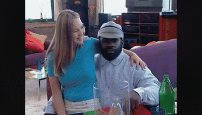 Man And Woman Posing On Couch GIF