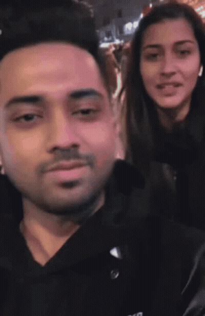 Man And Woman Posing GIF