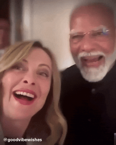 Man And Woman Posing Saying Goodvibewishes GIF