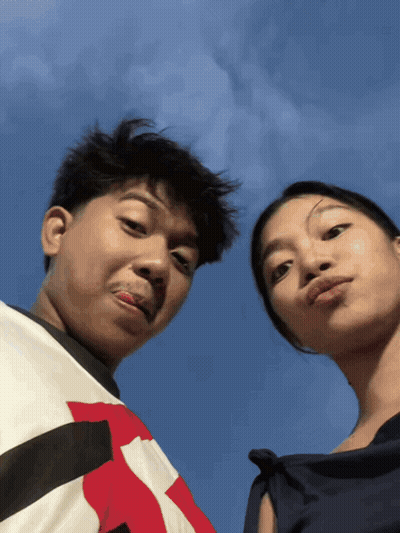 Man And Woman Posing, Shirt With Letter R GIF