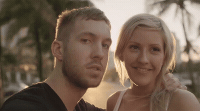 Man And Woman Posing Smiling GIF