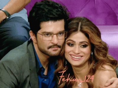 Man And Woman Posing With Fehu GIF