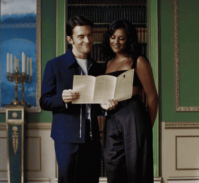 Man And Woman Reading Book Together GIF