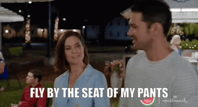 Man And Woman Saying Fly By The Seat Of My Pants GIF