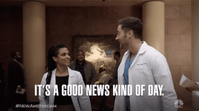 Man And Woman Saying It's A Good News Kind Of Day GIF