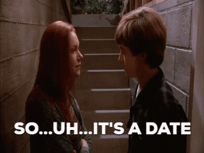 Man And Woman Saying So Uh It's A Date GIF