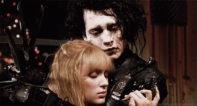 Man And Woman Saying The Rose And The Darkness GIF