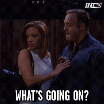 Man And Woman Saying What's Going On GIF