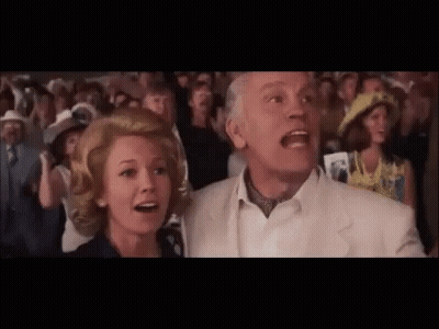 Man And Woman Screaming In Crowd GIF