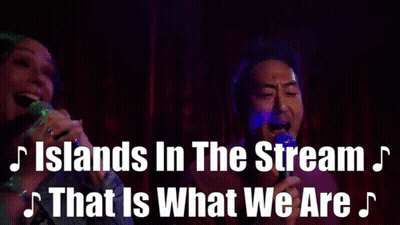 Man And Woman Singing Islands In The Stream GIF