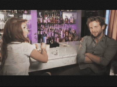 Man And Woman Sitting At Bar Talking GIF