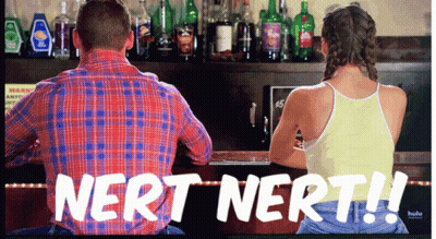 Man And Woman Sitting At Bar With Nert Nert GIF