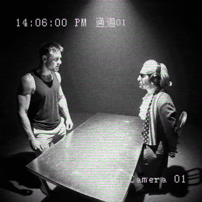 Man And Woman Sitting At Table 14:06 PM GIF
