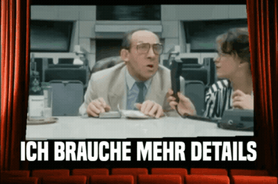 Man And Woman Sitting At Table GIF