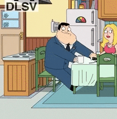 Man And Woman Sitting At Table With DLSV GIF