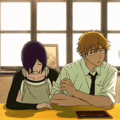 Man And Woman Sitting At Table With Folded Hands GIF
