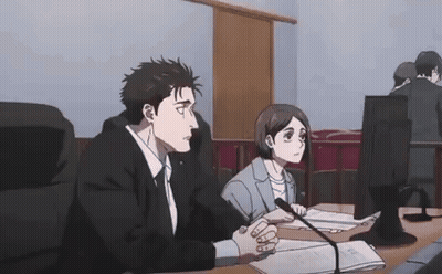 Man And Woman Sitting At Table With Microphone GIF