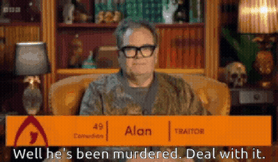 Man And Woman Sitting At Table Woman In Yellow Dress And Earrings GIF