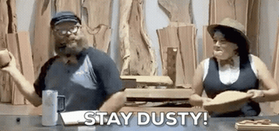 Man And Woman Sitting At Woodworking Shop GIF