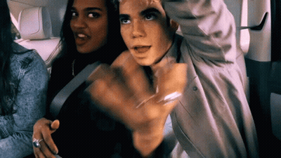Man And Woman Sitting In Back Seat Arms Outstretched GIF