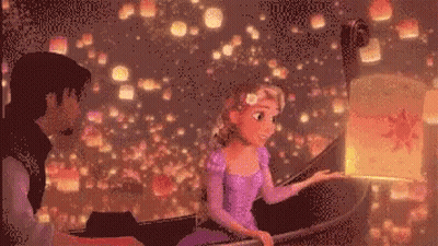 Man And Woman Sitting In Boat Looking At Lanterns GIF