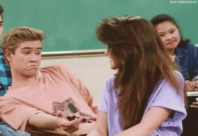 Man And Woman Sitting In Classroom Looking At Each Other GIF