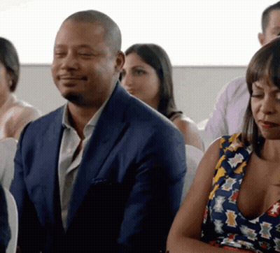 Man And Woman Sitting In Classroom With Eyes Closed GIF