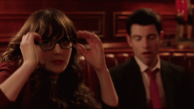 Man And Woman Sitting In Dark Room GIF