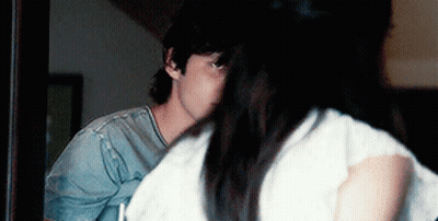 Man And Woman Sitting In Dark Room GIF