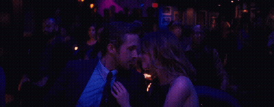 Man And Woman Sitting In Dark Room GIF