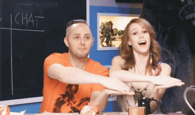 Man And Woman Sitting In Front Of Chat Chalkboard GIF