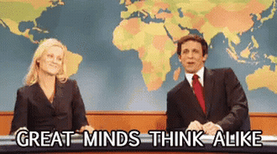 Man And Woman Sitting In Front Of Map Great Minds Think Alike GIF