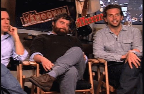 Man And Woman Sitting In Front Of Not Up Here Door GIF