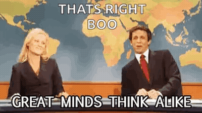 Man And Woman Sitting In Front Of World Map GIF