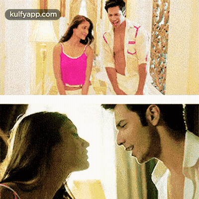 Man And Woman Sitting In Room With Kulfyapp.com GIF