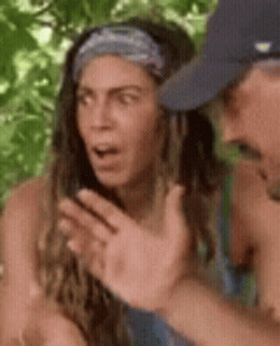 Man And Woman Sitting In Woods GIF