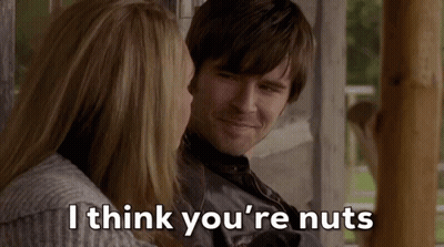 Man And Woman Sitting Man Says I Think You're Nuts GIF
