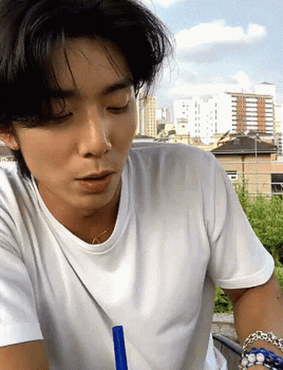 Man And Woman Sitting, Man With Neck Microphone GIF