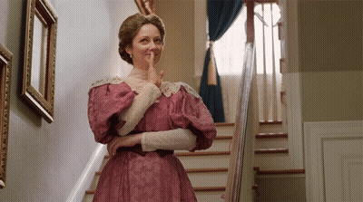 Man And Woman Sitting Next To Each Other GIF