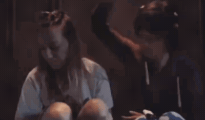 Man And Woman Sitting Next To Each Other GIF