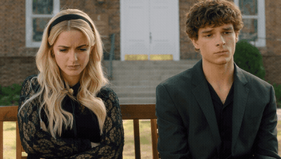 Man And Woman Sitting On Bench GIF