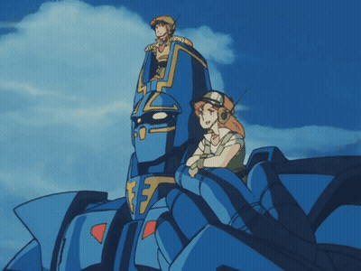 Man And Woman Sitting On Blue Robot Number 17 GIF