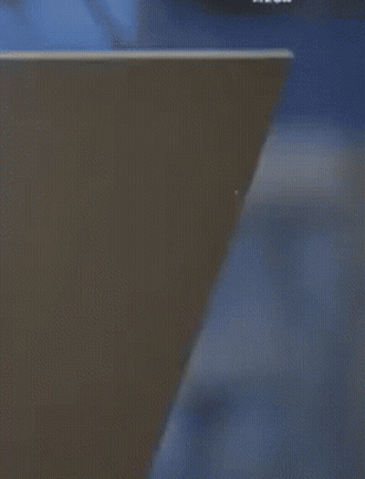 Man And Woman Sitting On Couch GIF